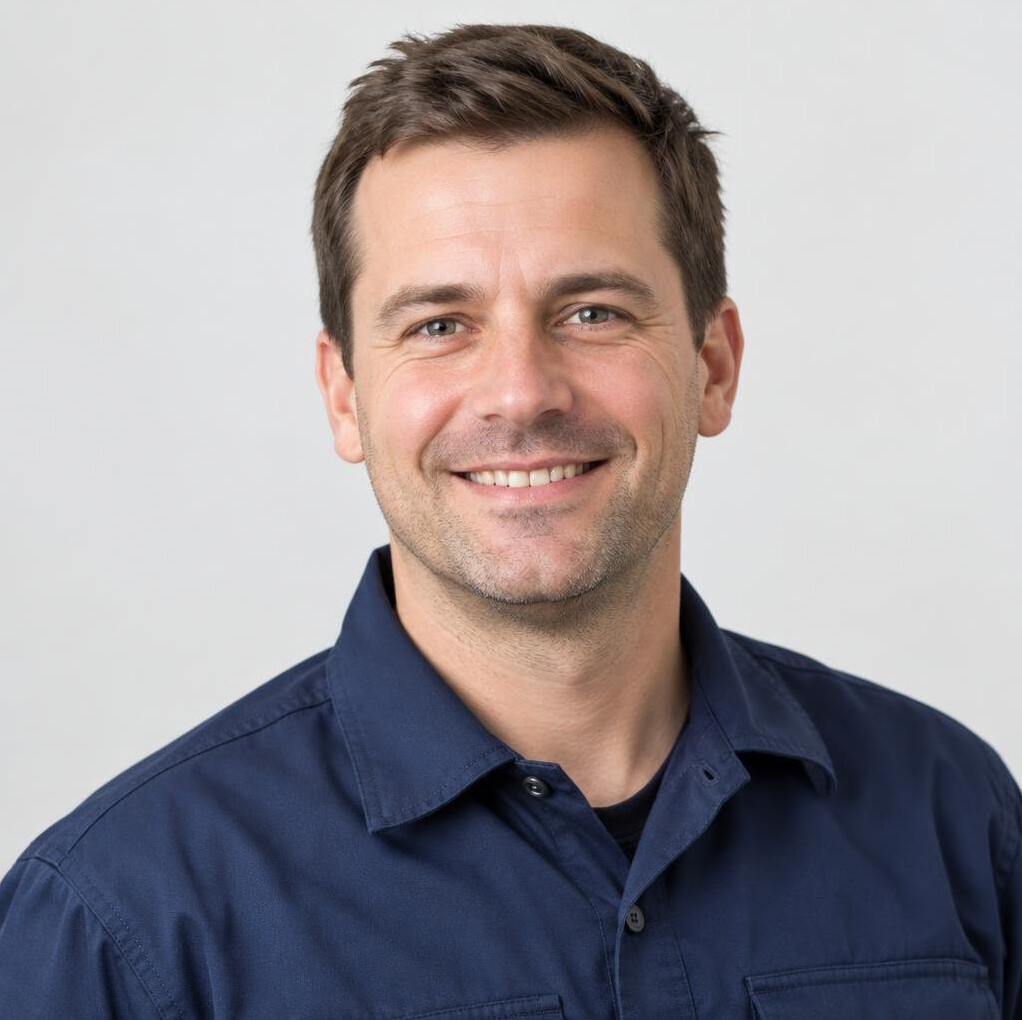 Portrait of a smiling man in work shirt