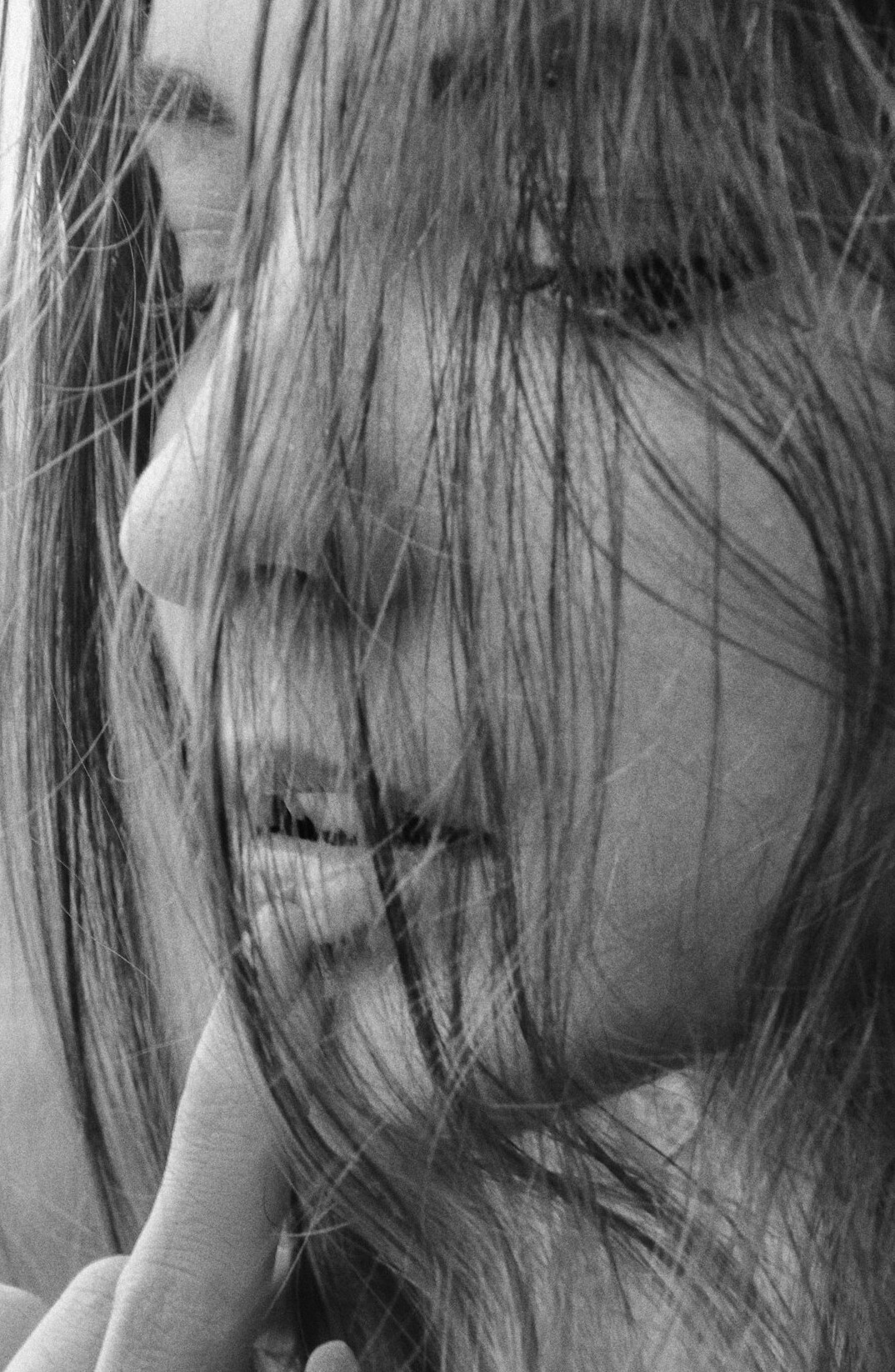Portrait of a smiling woman with long hair